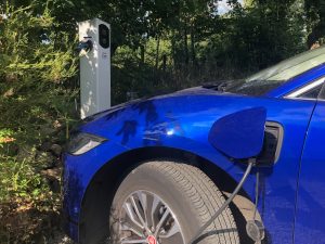 Blue car charging
