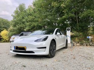 White Tesla charging